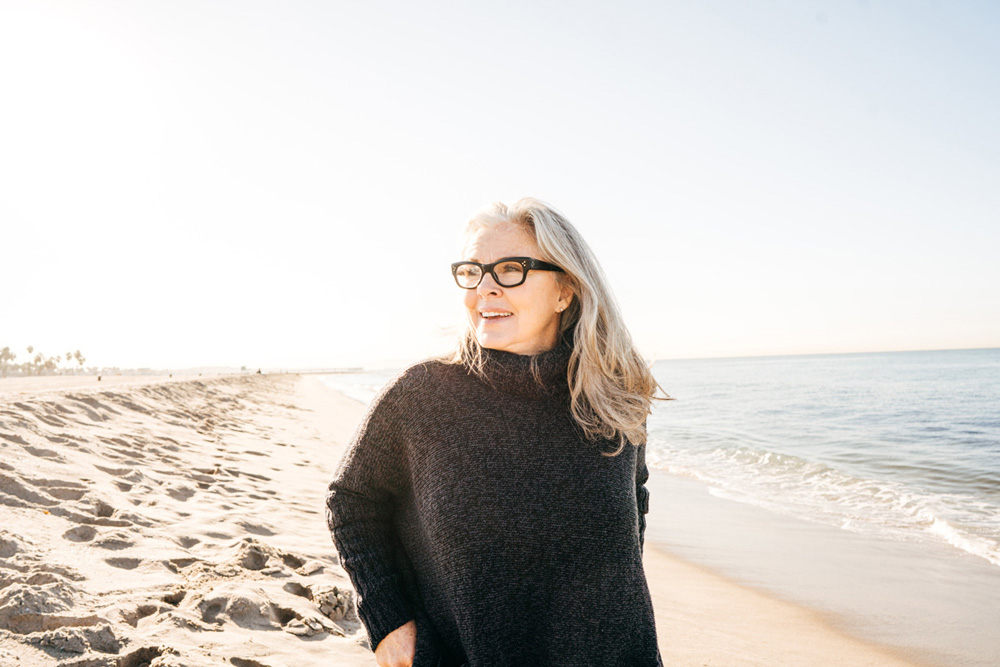 Woman walking on the beach